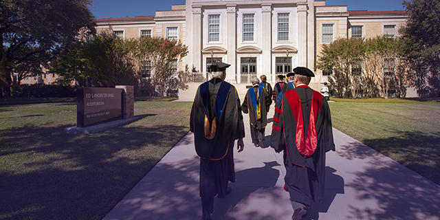 TCU faculty in regalia process to Ed Landreth Hall