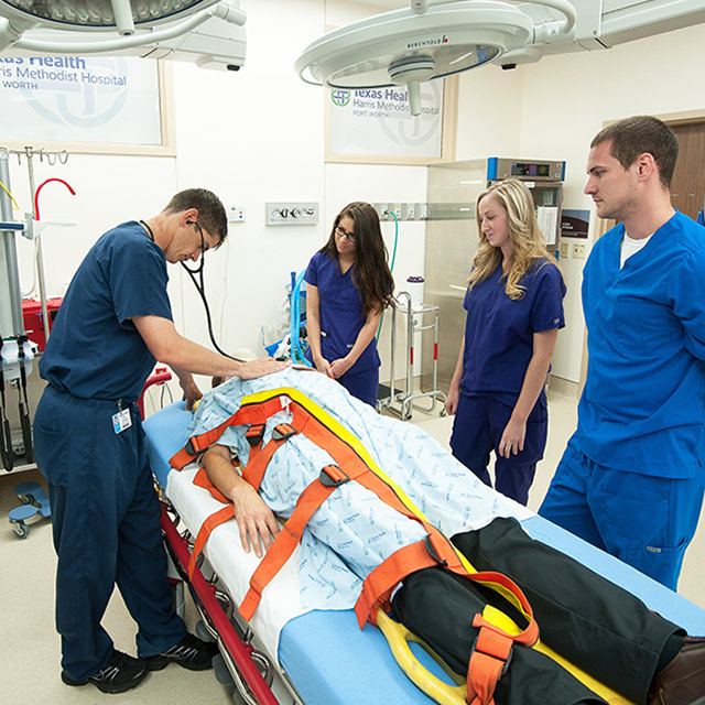TCU Pre-health students in an emegency simulation