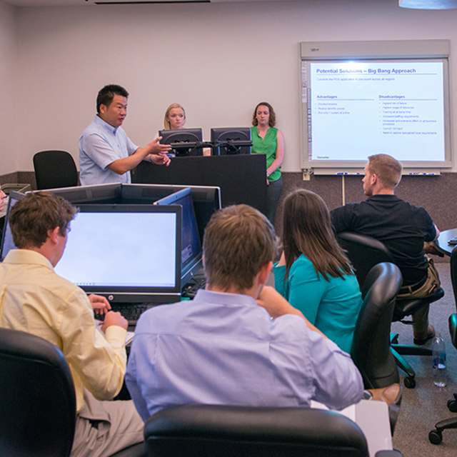 Business information systems professor in classroom