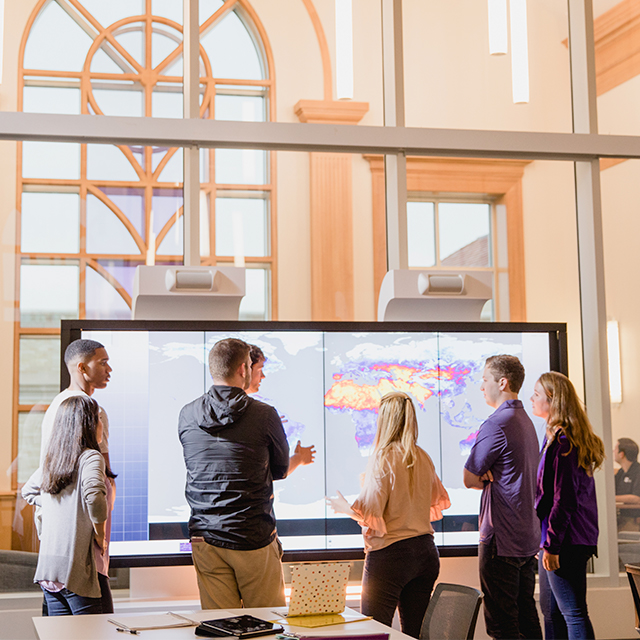 Student discussion in Rees-Jones Hall