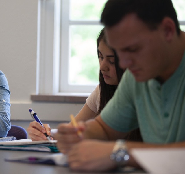 Students working on a creative writing assignment