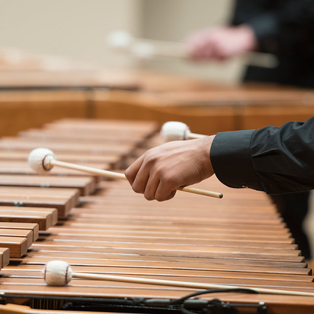 Close up of hands with mallets