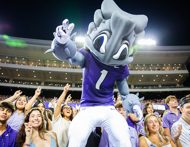 SuperFrog giving the Go Frogs hand sign