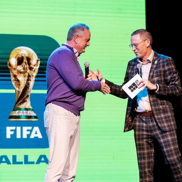 Sonny Dykes on the stage at FIFA draw