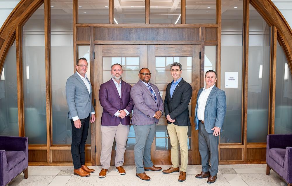 leaders pose together