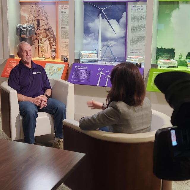 Tom Seng speaks with the media