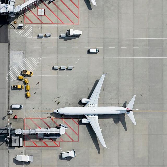 Aerial image of a commercial plane at an airpot