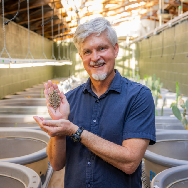 Dean Williams Holding a Horned Frog