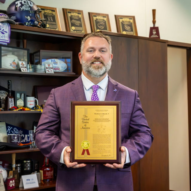 Reuben Burch with 50th Patent