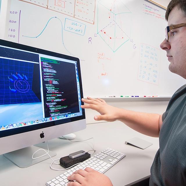 student on computer