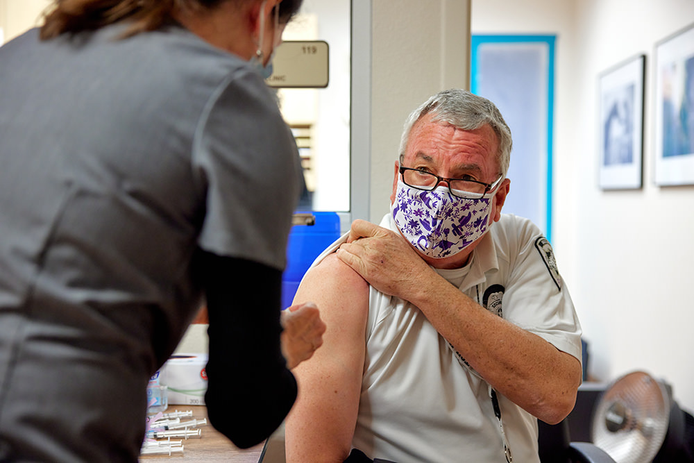 TCU Campus Police officer receives first dose of vaccine