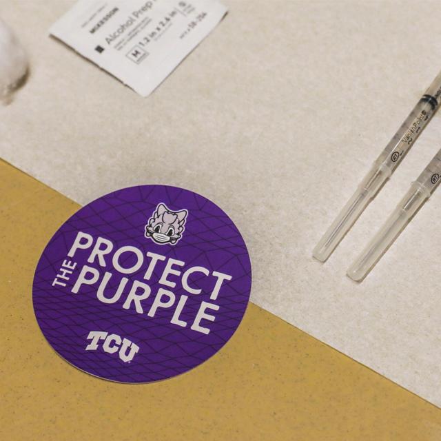 TCU nursing students administering vaccine